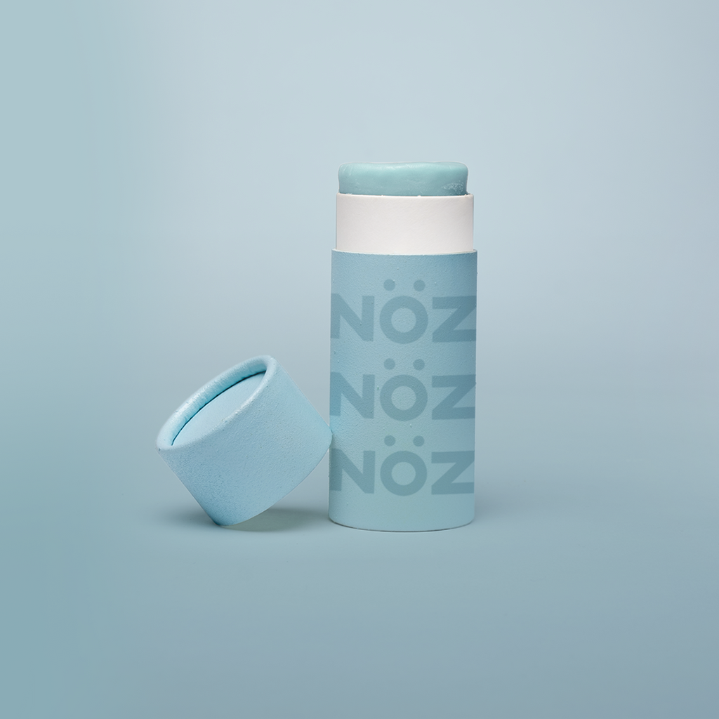 Nöz sunscreen tube in mint green.