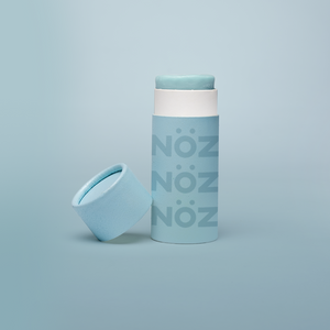 Nöz sunscreen tube in mint green.