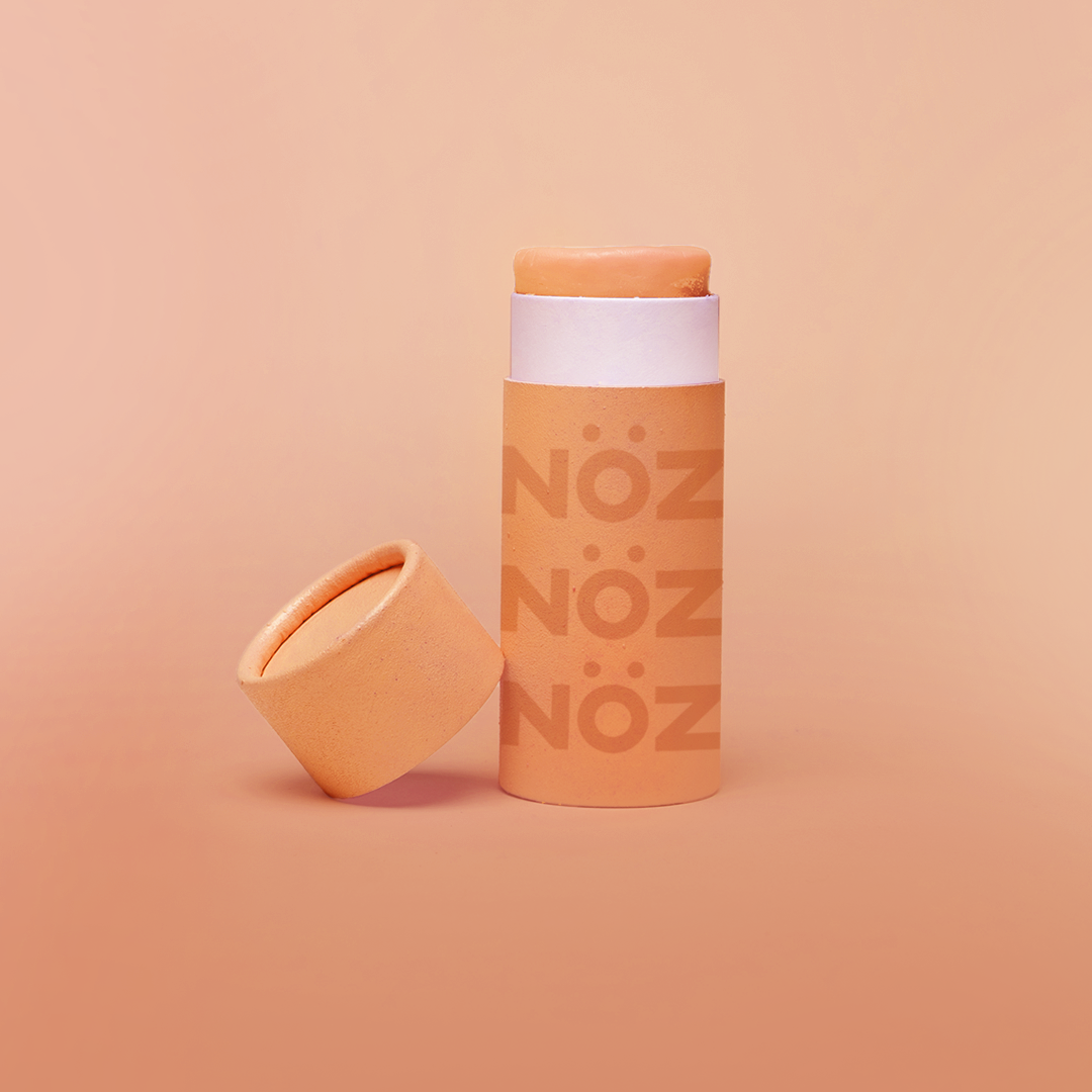 Nöz sunscreen tube in orange.