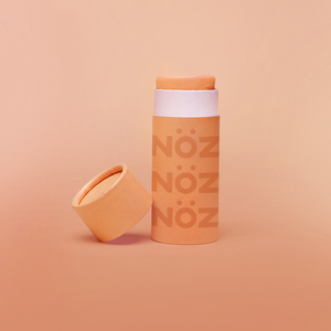 Nöz sunscreen tube in orange.