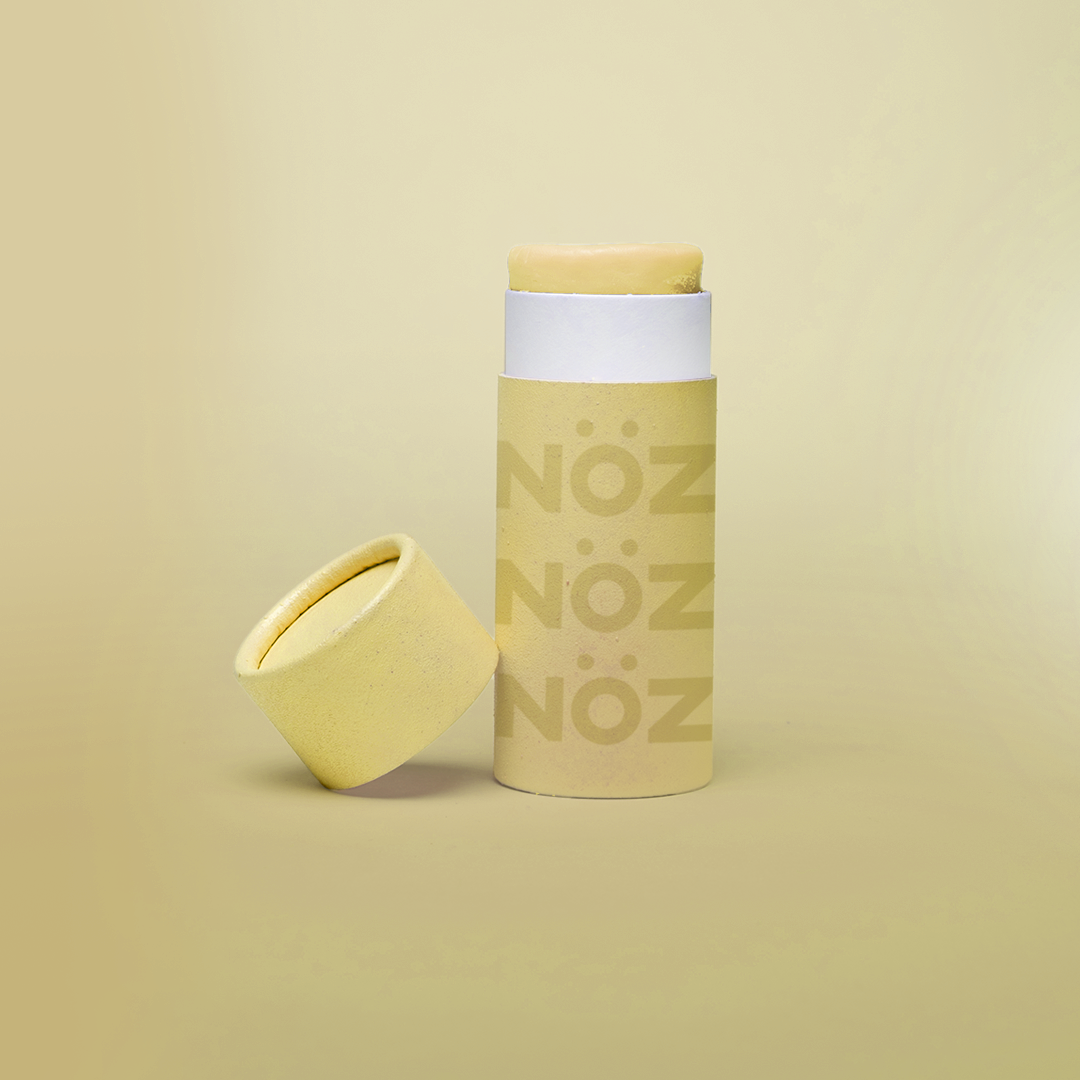 Nöz sunscreen tube in yellow.